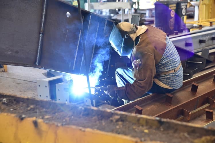 Here is a welder at work. Welding is one of the most high paying construction jobs.